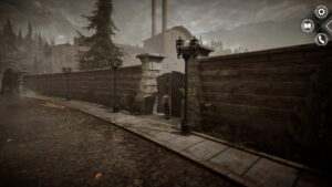 Kate Walker standing before the factory entrance in Syberia - Remastered